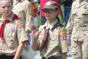 William waves to the crowd during the Memorial Day Parade.